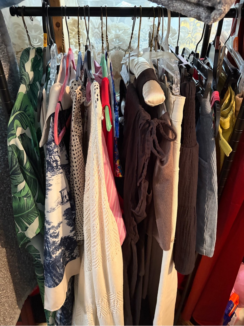 Mixed Women's Clothing Rack - Neutral & Bright Pieces